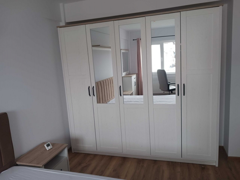 Apartament la cheie , 2 camere decomandate , parcare subterana .