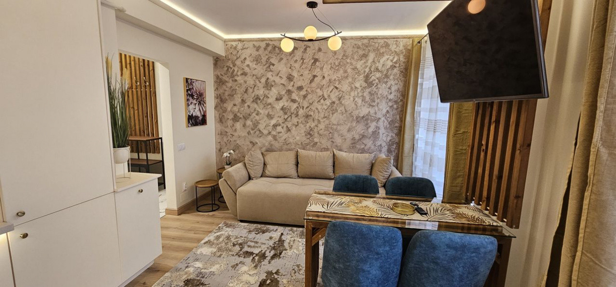 Apartament 2 camere,ultrafinisat,mobilat,utilat la cheie,terasa 12 mp.