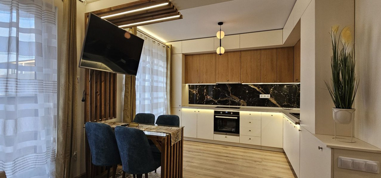 Apartament 2 camere,ultrafinisat,mobilat,utilat la cheie,terasa 12 mp.