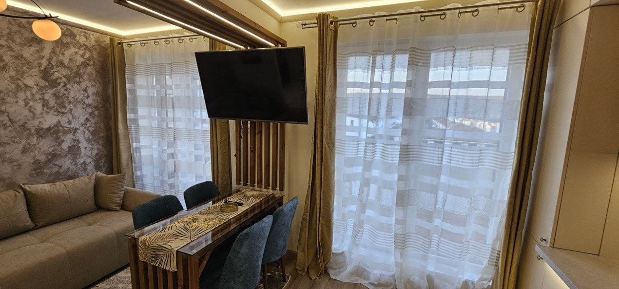 Apartament 2 camere,ultrafinisat,mobilat,utilat la cheie,terasa 12 mp.