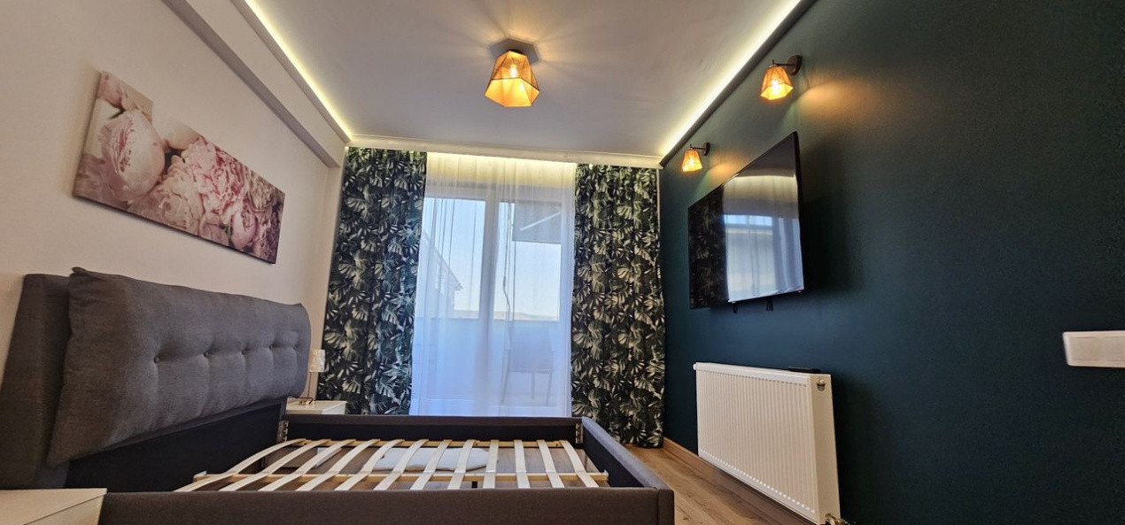 Apartament 2 camere,ultrafinisat,mobilat,utilat la cheie,terasa 12 mp.