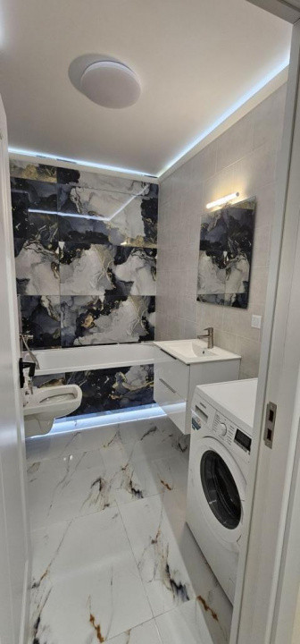 Apartament 2 camere,ultrafinisat,mobilat,utilat la cheie,terasa 12 mp.