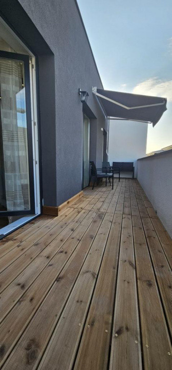 Apartament 2 camere,ultrafinisat,mobilat,utilat la cheie,terasa 12 mp.