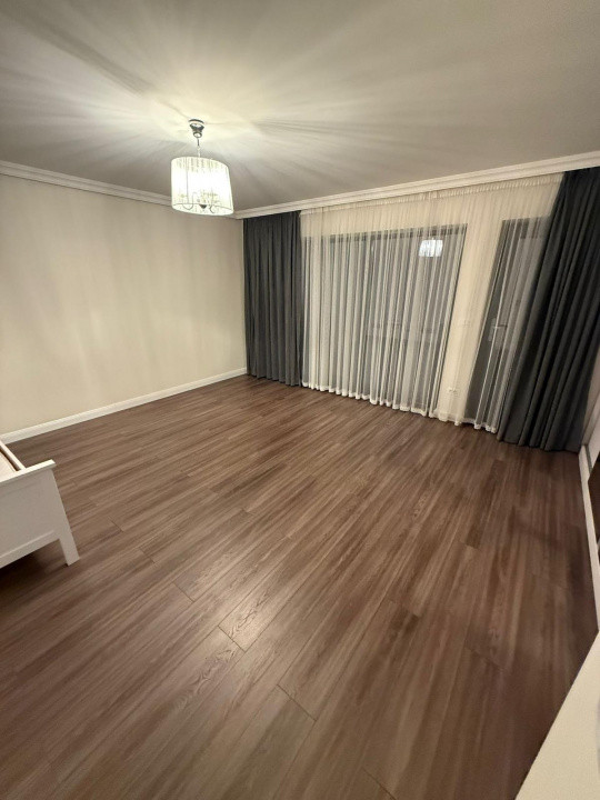 Casă duplex modernă cu acces separat, terase panoramice și curte privată – Zona 