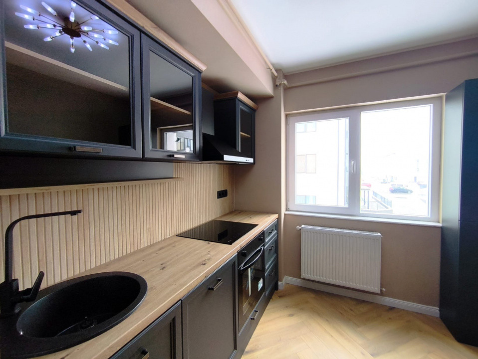 Apartament 2 camere FInisat 55mp zona Terra ,Floresti 