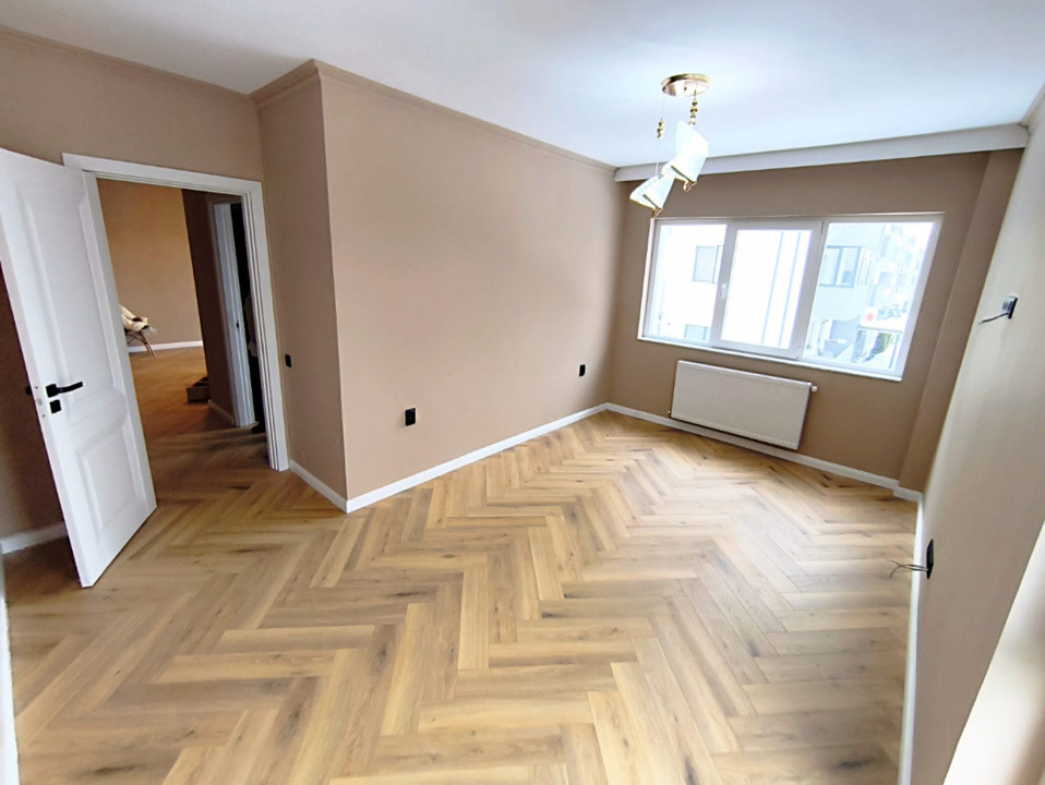 Apartament 2 camere FInisat 55mp zona Terra ,Floresti 