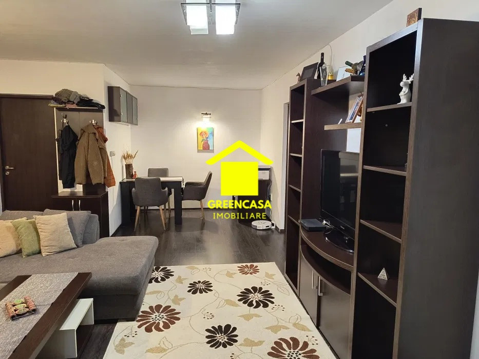 Apartament 3 camere,58mp,balcon 4mp,parcare,zona Terra