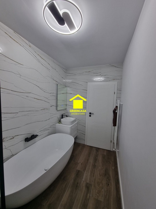 Apartament | vanzare | 3 camere | 2 bai | 76 mp | terasa 14 mp | garaj | Eroilor