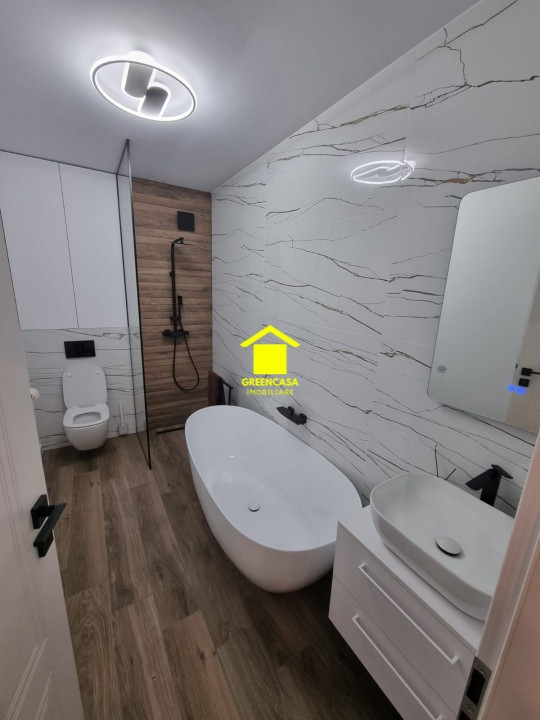 Apartament | vanzare | 3 camere | 2 bai | 76 mp | terasa 14 mp | garaj | Eroilor