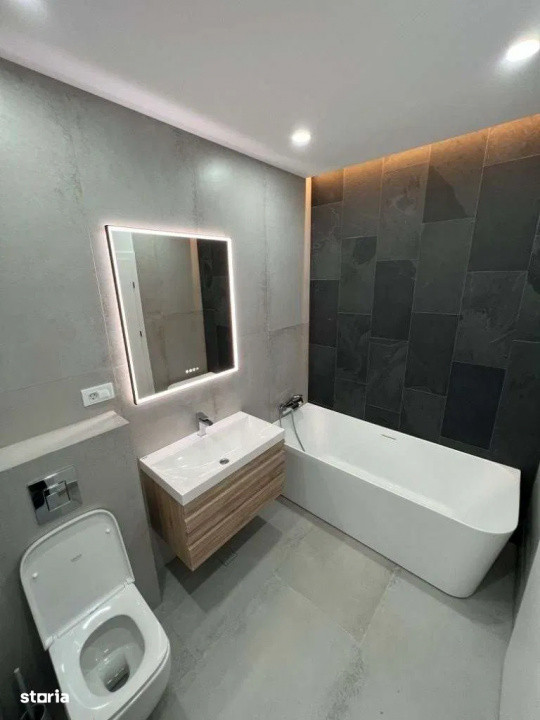 Inchiriez apartament 2 camere + doua locuri parcare, ultracentral, nou